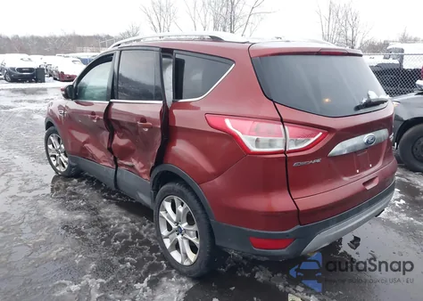 2015 Ford Escape Titanium z USA, uszkodzony, nr VIN 1FMCU0J93FUA94497